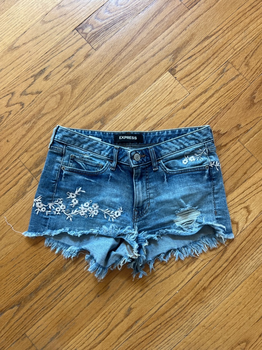 Express Blue Denim Cutoff Shorts with White Floral Embroidery size 4